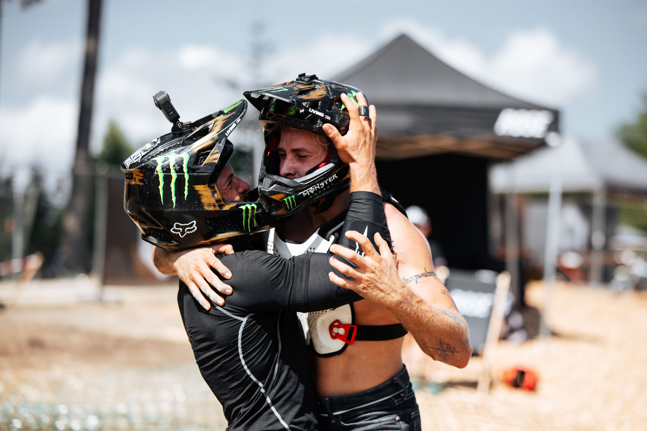 Daniel and Elias Ruso celebrating in full-face helmets after a contest run